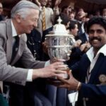 Kapil Dev lifting the 1983 Cricket World Cup trophy