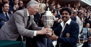 Kapil Dev lifting the 1983 Cricket World Cup trophy